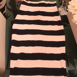 Skin tight over the knee skirt